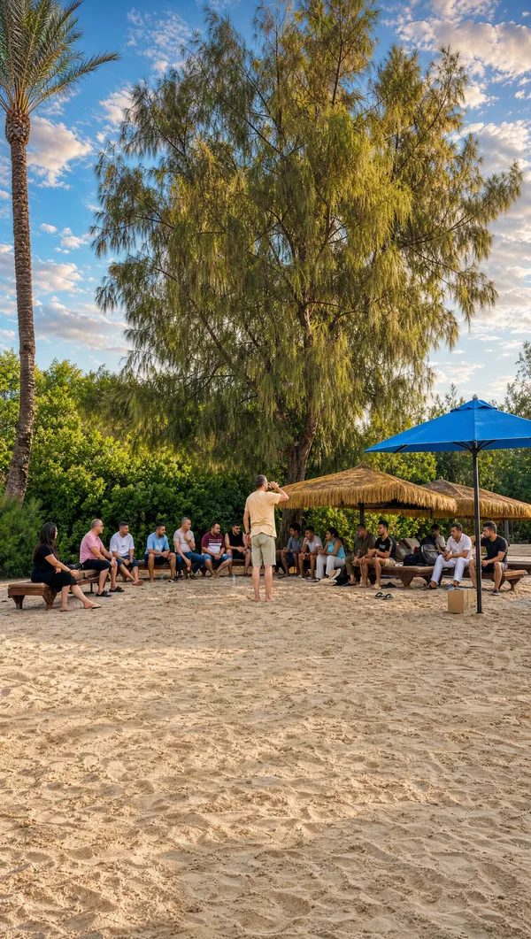 Le groupe en cercle sur la plage, autour du formateur